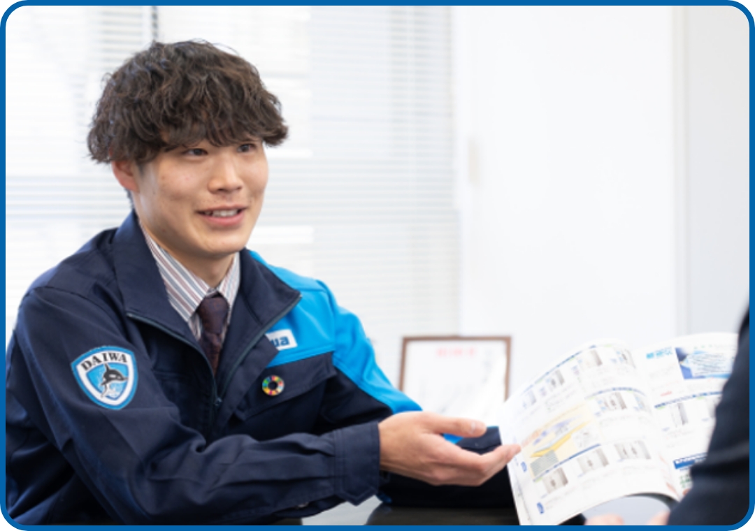 営業する社員の写真